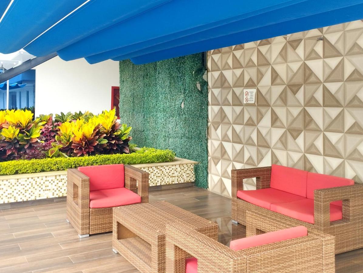 Hotel Royal Elim International Cali Exterior photo The Sky Lounge