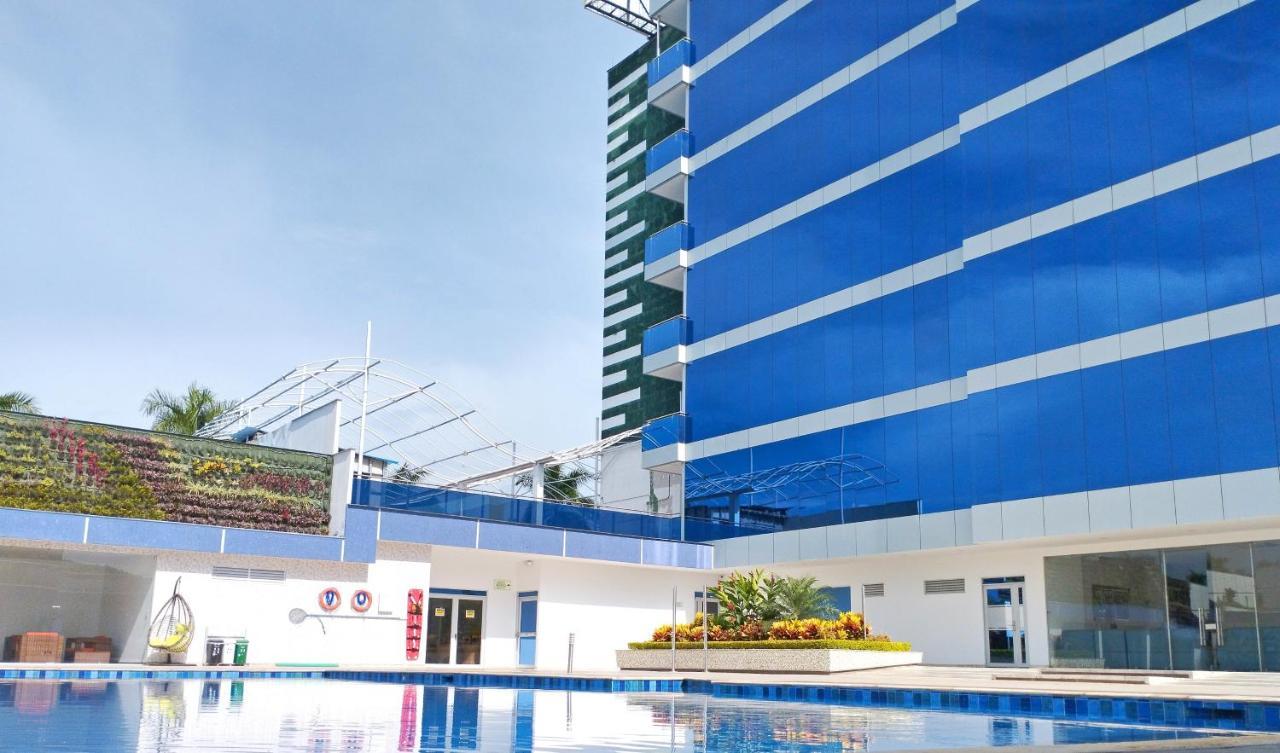 Hotel Royal Elim International Cali Exterior photo The pool at the hotel