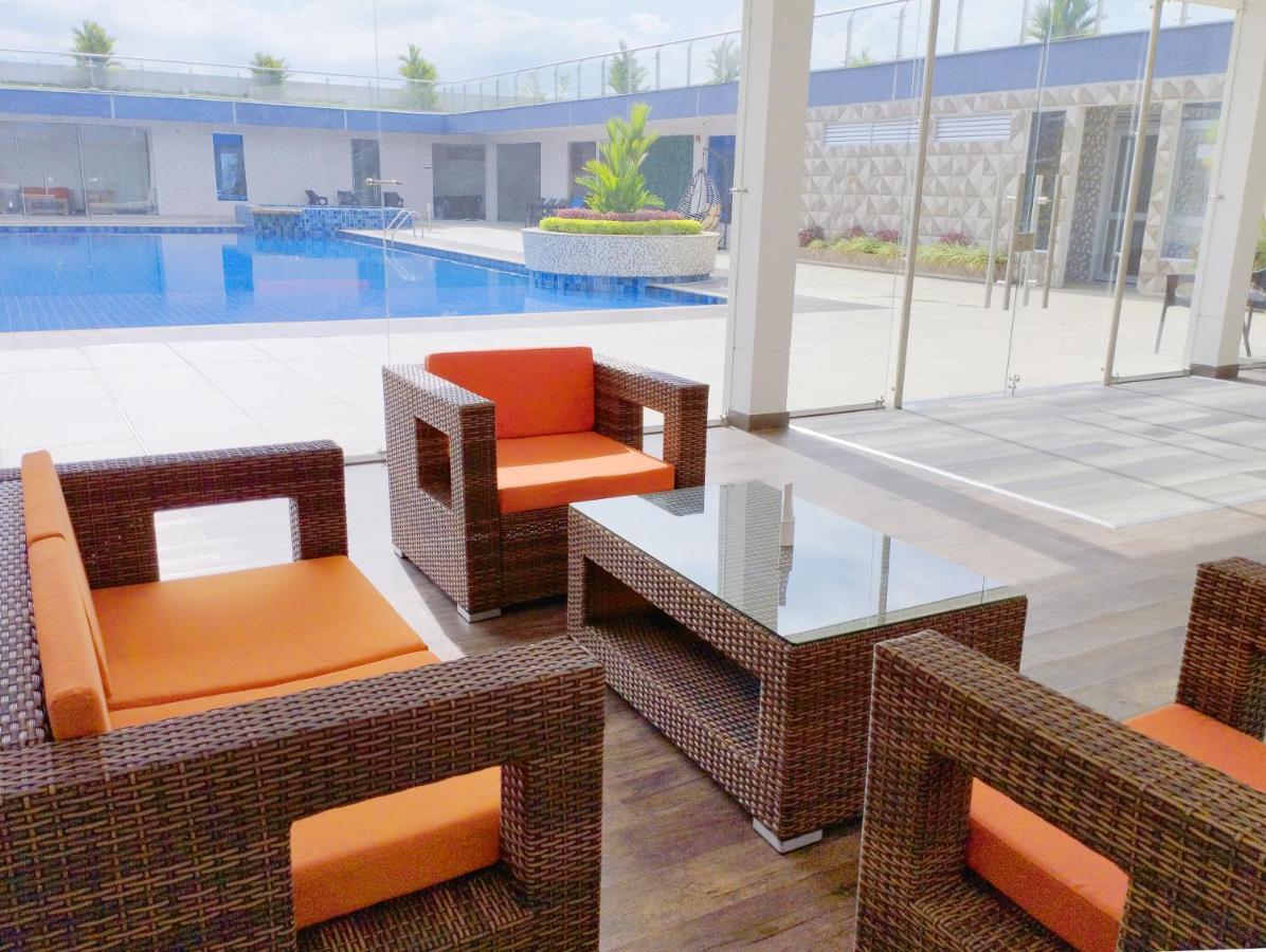 Hotel Royal Elim International Cali Exterior photo WOVEN PE rattan