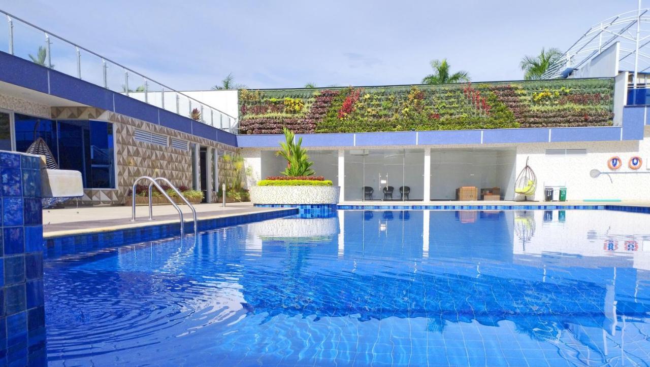 Hotel Royal Elim International Cali Exterior photo The swimming pool at the hotel