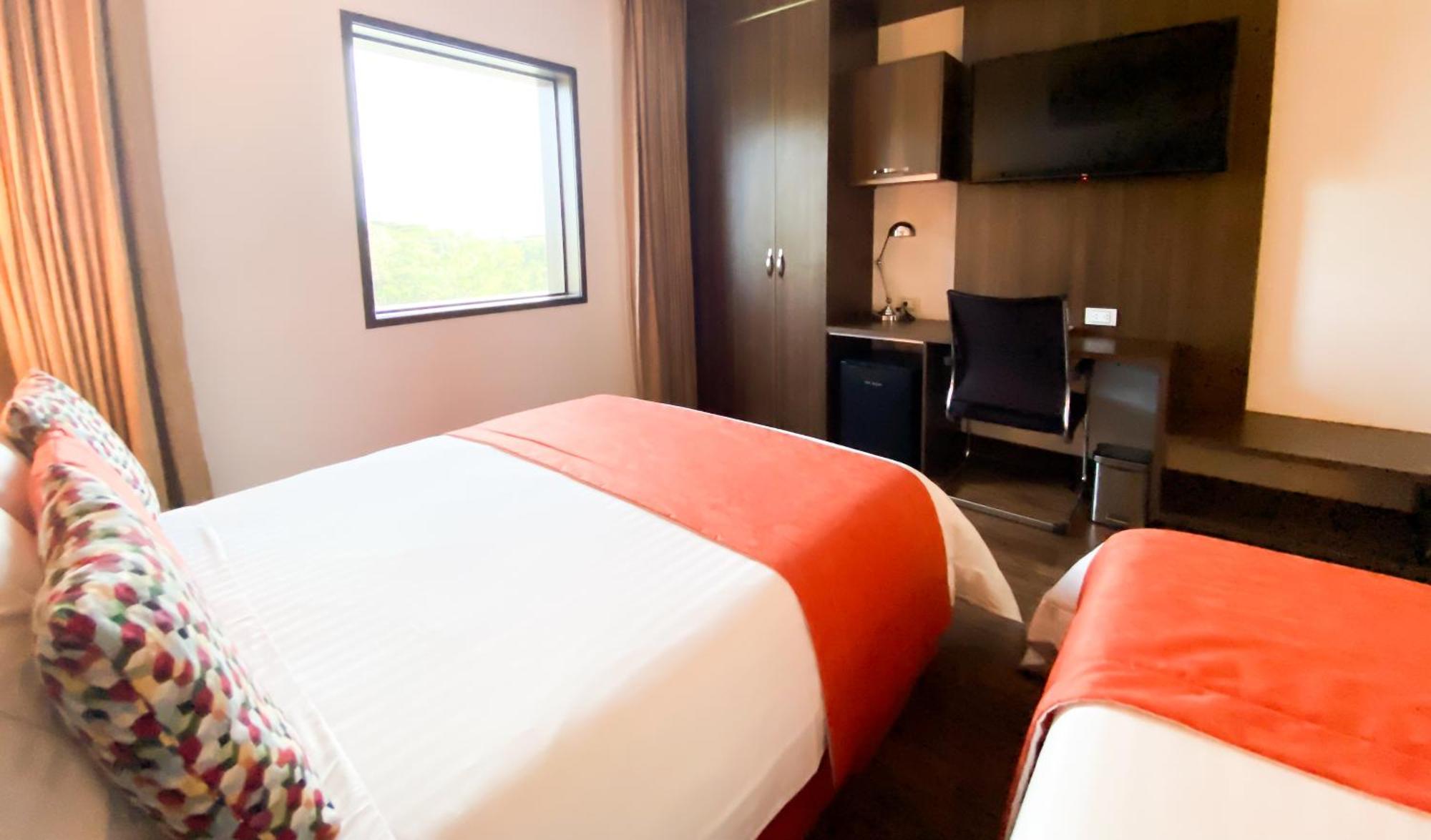 Hotel Royal Elim International Cali Exterior photo A room at the hotel