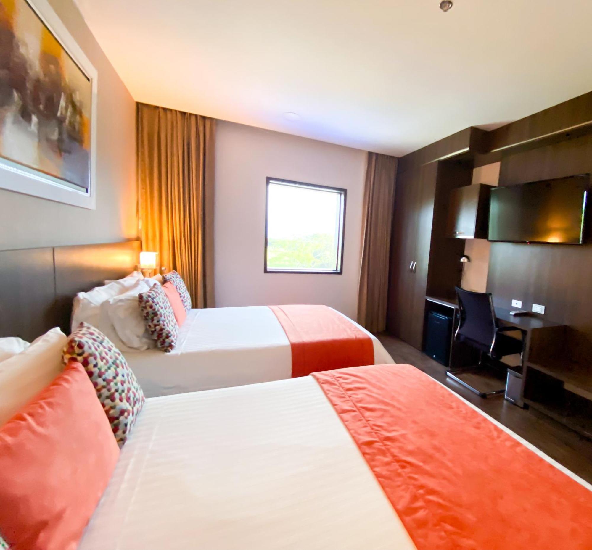 Hotel Royal Elim International Cali Exterior photo A room at the hotel
