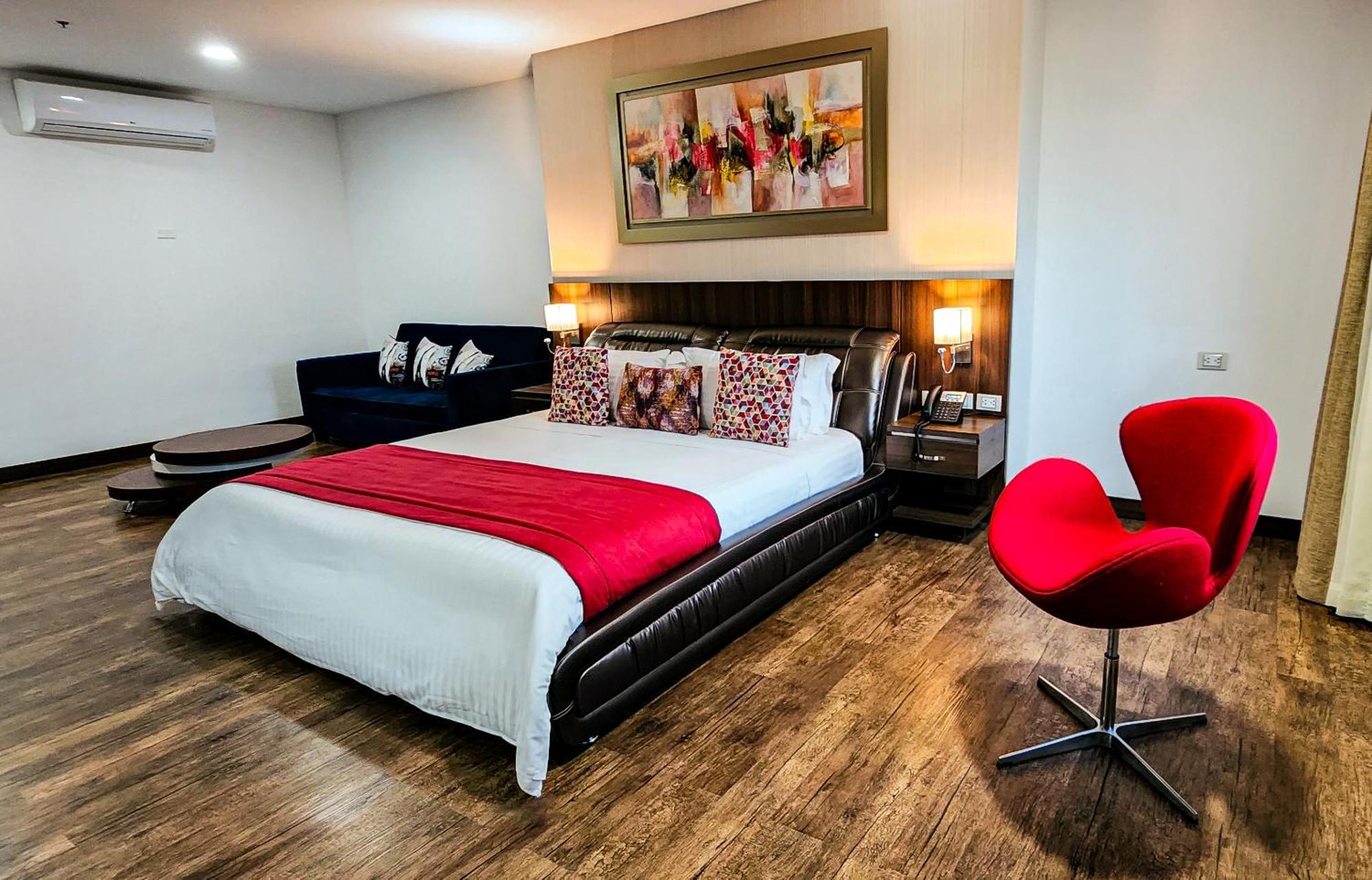 Hotel Royal Elim International Cali Exterior photo A bedroom at the hotel
