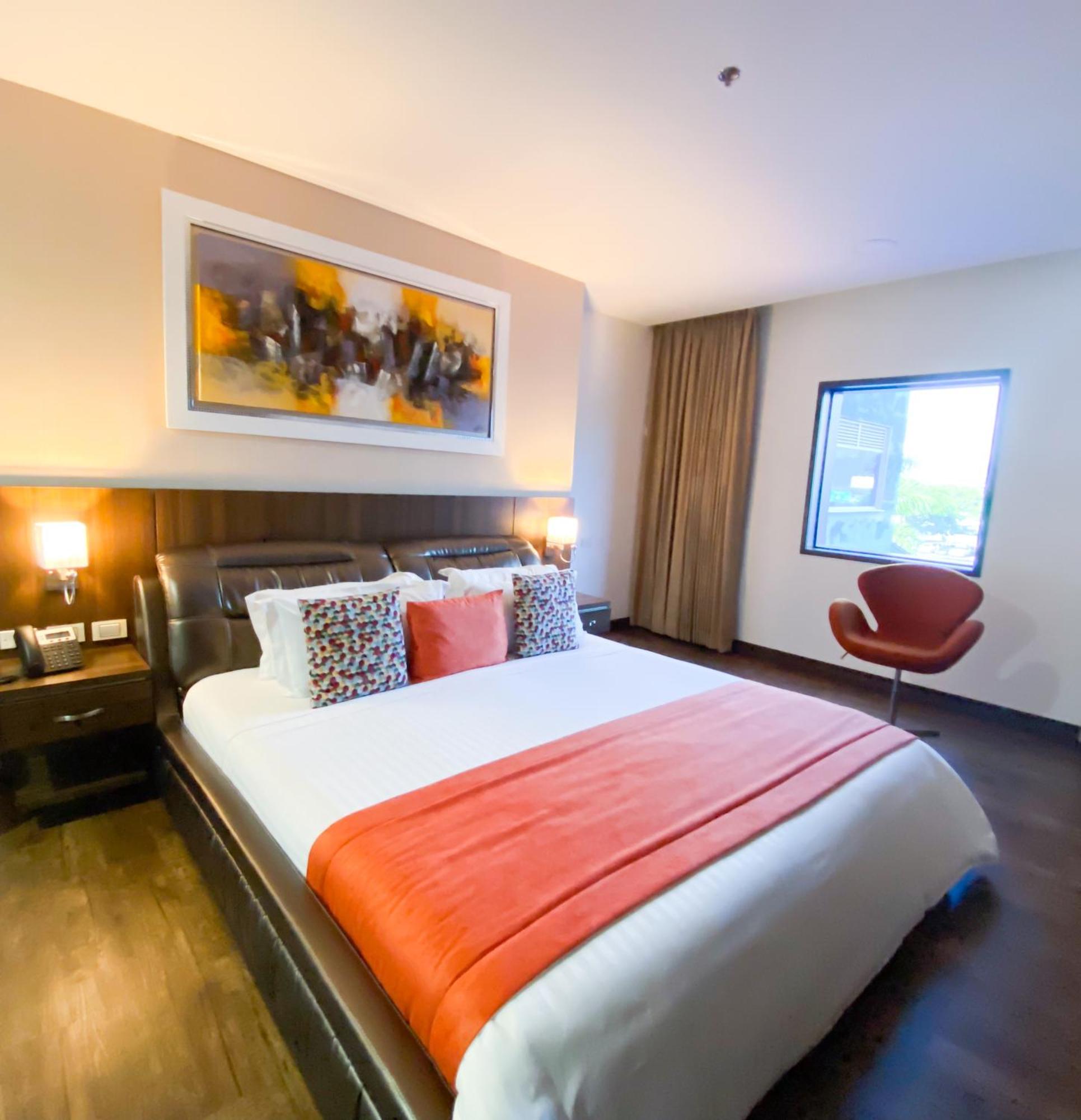 Hotel Royal Elim International Cali Exterior photo A bedroom at the hotel