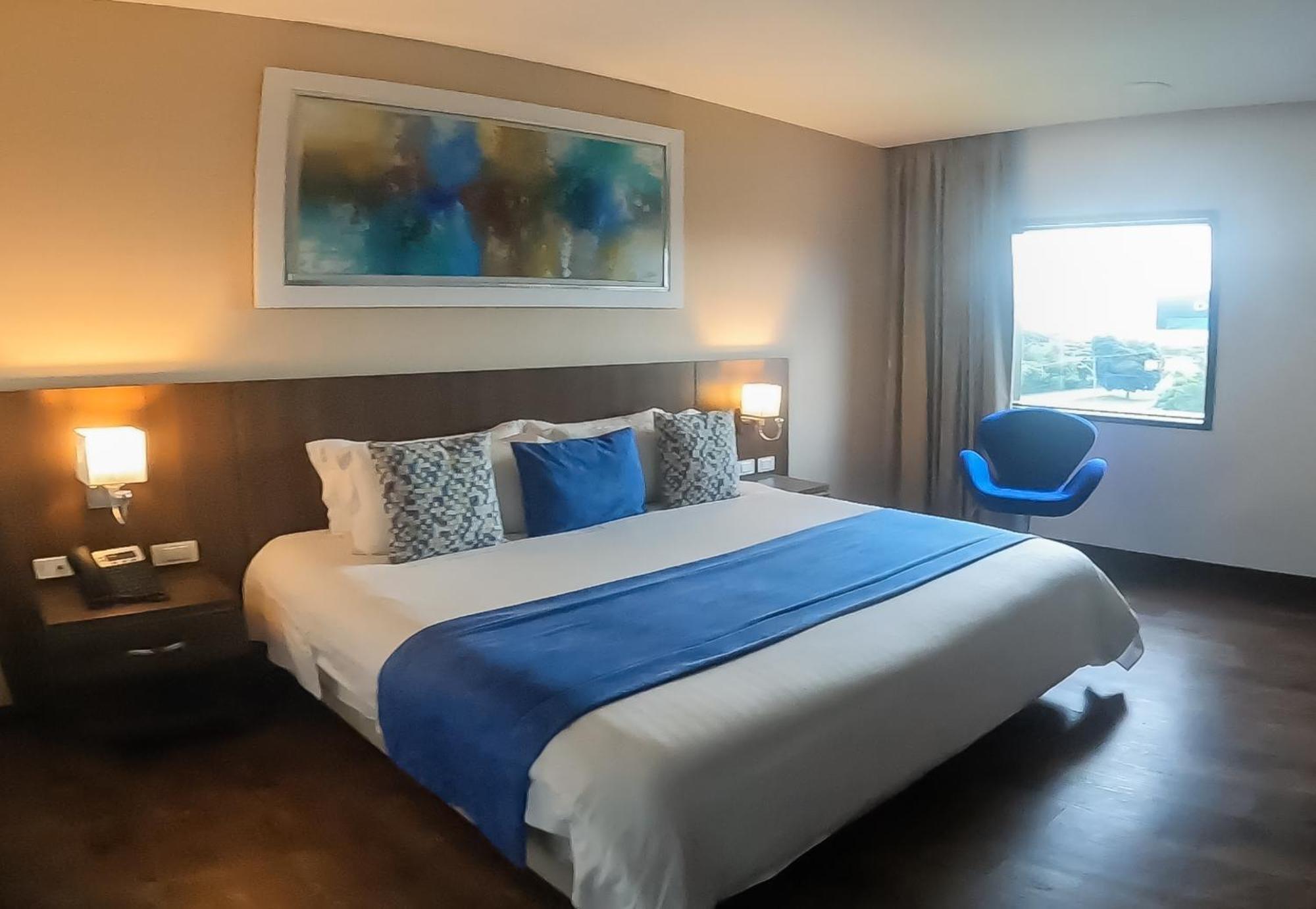 Hotel Royal Elim International Cali Exterior photo A room at the hotel