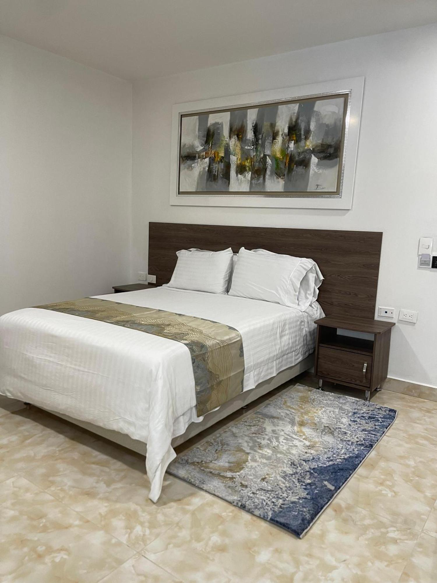 Hotel Royal Elim International Cali Exterior photo A bedroom at the hotel